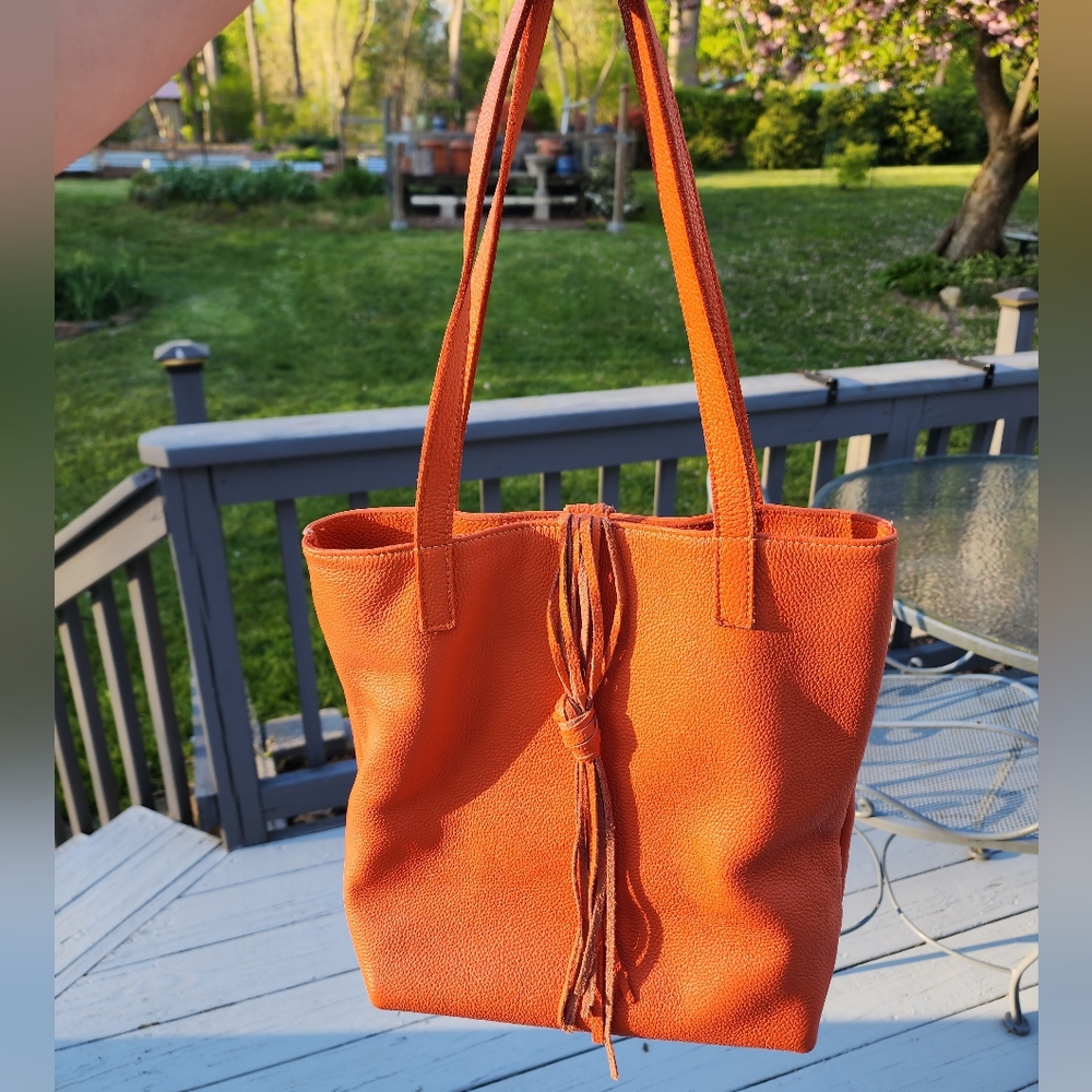 Carla Mancini Orange leather shoulder bag with fringe tassels Designer Bag